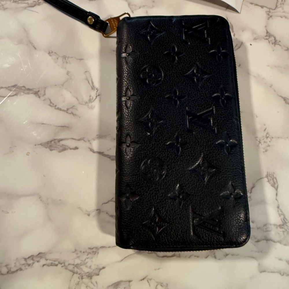 Louis Vuitton Empereintie Monogram wallet in black